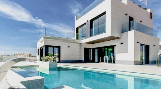 white concrete building under blue sky during daytime
